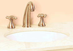 Under-mount sink is attached underneath the countertop.