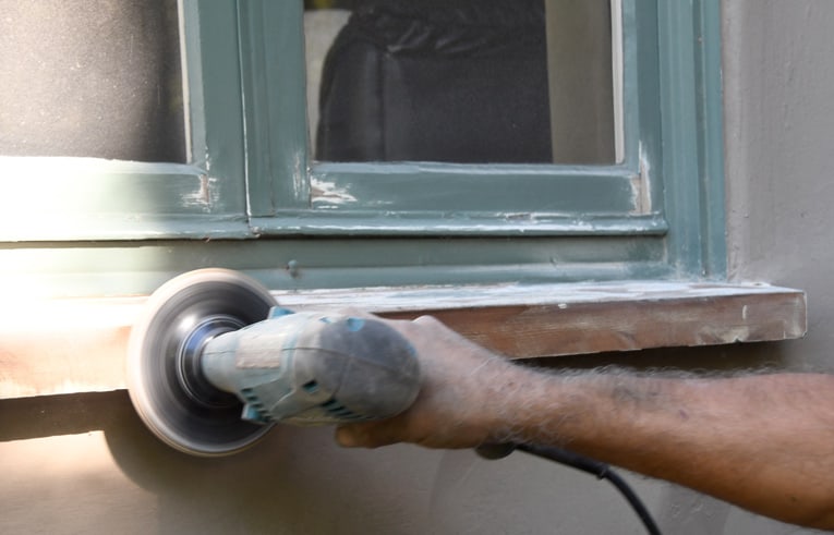 Disc sander sanding window sill