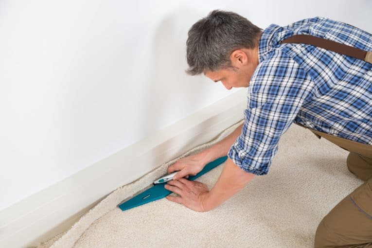installing carpeting