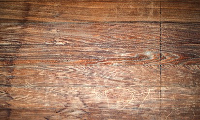 Reclaimed wood floors are loaded with natural character. Photo: Clay Gilpin | Dreamstime